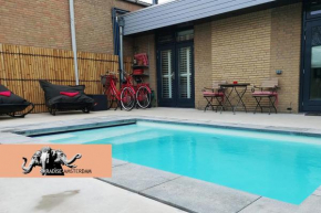 Paradise Amsterdam bungalow of 80 m2 with private pool - All inclusive, breakfast, parking, use of bikes, tourist tax and much more